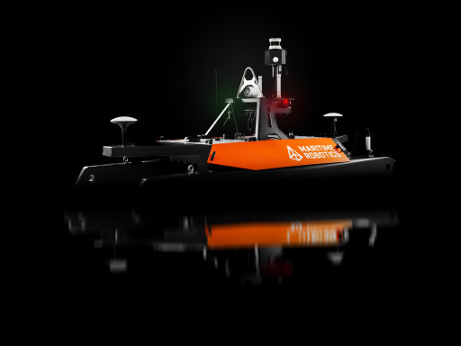 Side angle of Otter USV rendered on black background, showing full structure and sensor positioning.